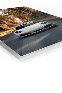 White Sports Car on a Golden Tree-Lined Road premium metal wall art Ã¢â‚¬â€œ angled view