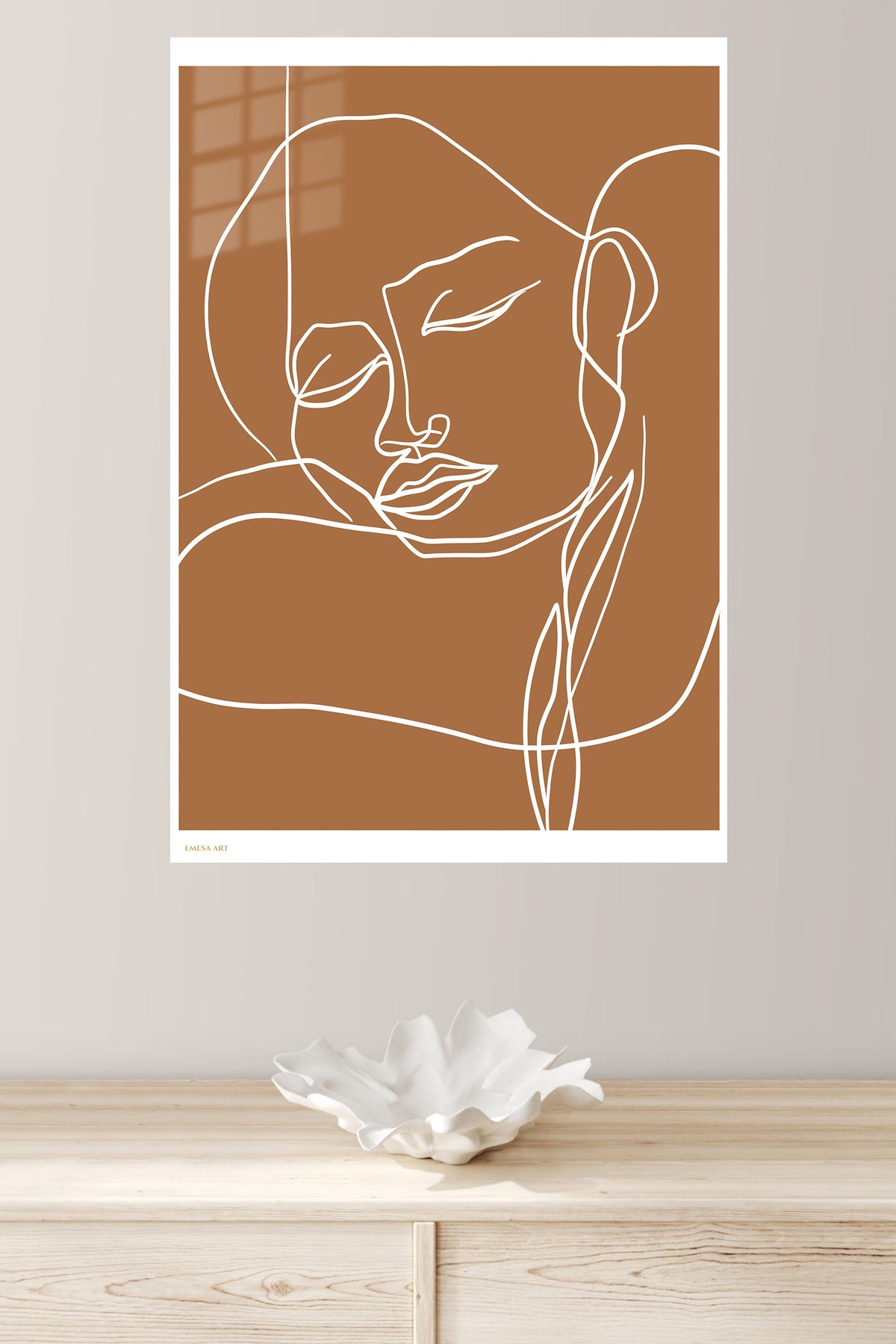 Terracotta Contour Face metal wall art displayed in a modern interior