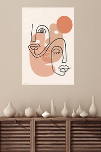 Terracotta Abstract Faces metal wall art displayed in a modern interior