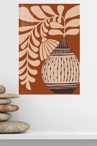 Earthen Vase and Botanical Leaves metal wall art displayed in a modern interior