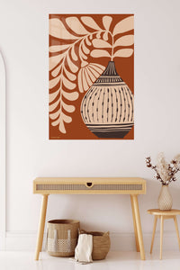 Earthen Vase and Botanical Leaves metal wall art displayed in a contemporary living space