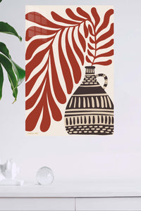 Terracotta Leaves and Patterned Vase metal wall art displayed in a modern interior