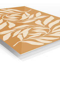 Cream Leaf Silhouettes on Ochre premium metal wall art – angled view