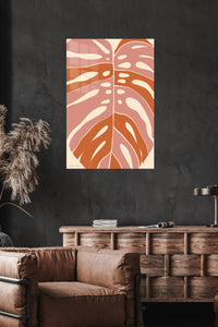 Terracotta Monstera Leaf metal wall art displayed in a modern interior