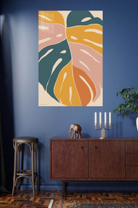 Earthtone Tropical Leaves metal wall art displayed in a modern interior
