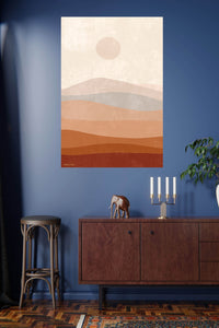 Terracotta Sun Over Layered Hills metal wall art displayed in a modern interior