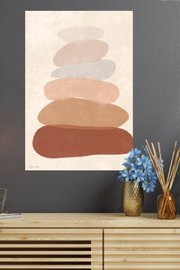 Earth Tone Stone Stack metal wall art displayed in a modern interior