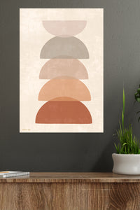 Earthy Stacked Arches metal wall art displayed in a modern interior