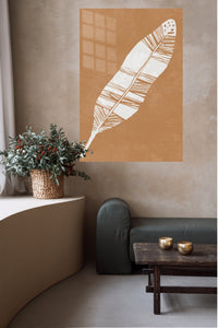 White Feather on Terracotta metal wall art displayed in a contemporary living space