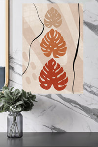 Terracotta Monstera Silhouettes metal wall art displayed in a modern interior