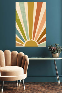 Earthtone Rising Sun metal wall art displayed in a contemporary living space