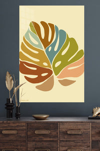 Earth Tone Monstera Leaves metal wall art displayed in a modern interior
