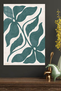 Teal Tropical Leaf Silhouette metal wall art displayed in a modern interior
