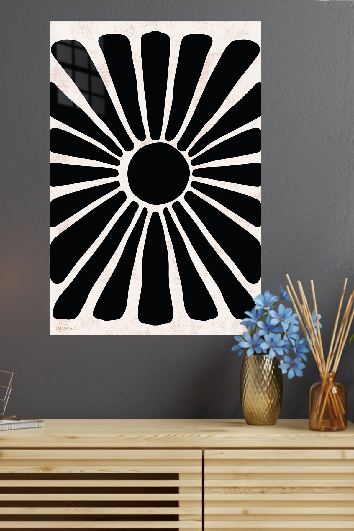 Bold Black Sunburst metal wall art displayed in a modern interior