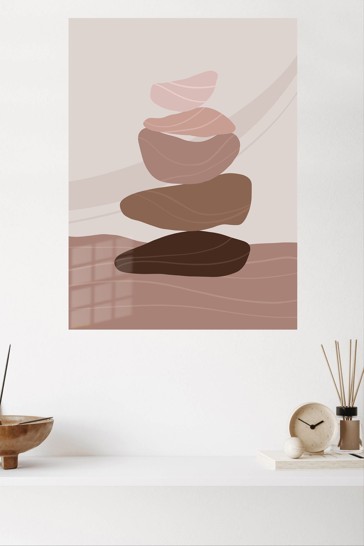 Earth Tone Balancing Stones metal wall art displayed in a modern interior