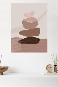 Earth Tone Balancing Stones metal wall art displayed in a modern interior