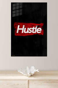 Hustle Red Brushstroke Typography metal wall art displayed in a modern interior