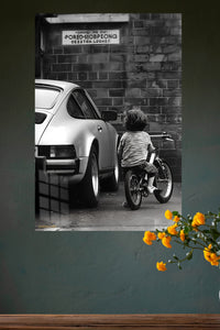 Little Rider by the Brick Wall metal wall art displayed in a modern interior