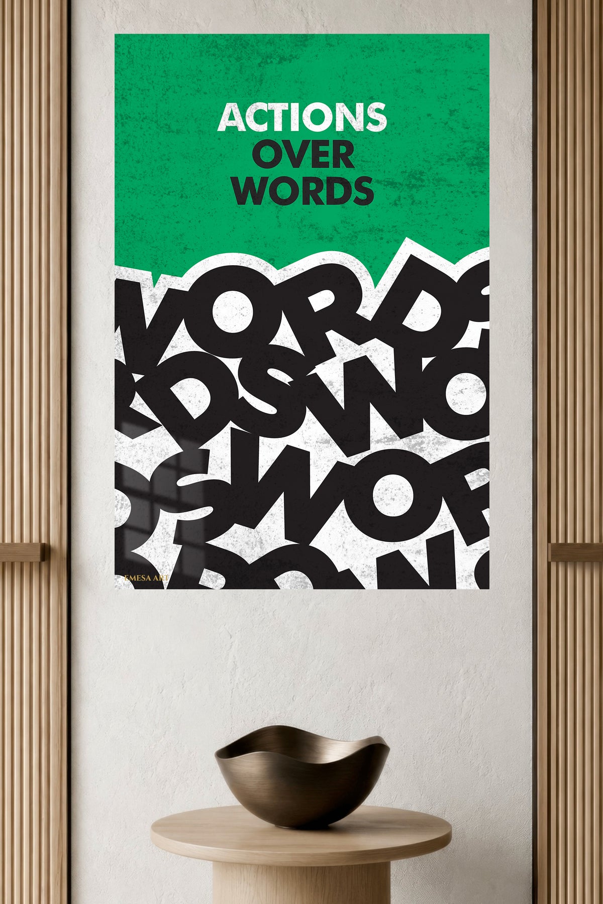 Actions Over Words metal wall art displayed in a modern interior
