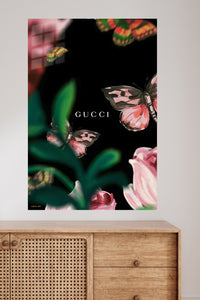 Pink Butterflies Among Garden Blooms metal wall art displayed in a modern interior