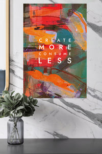 Create More Consume Less metal wall art displayed in a modern interior