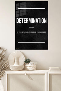 Determination Strength Quote metal wall art displayed in a modern interior
