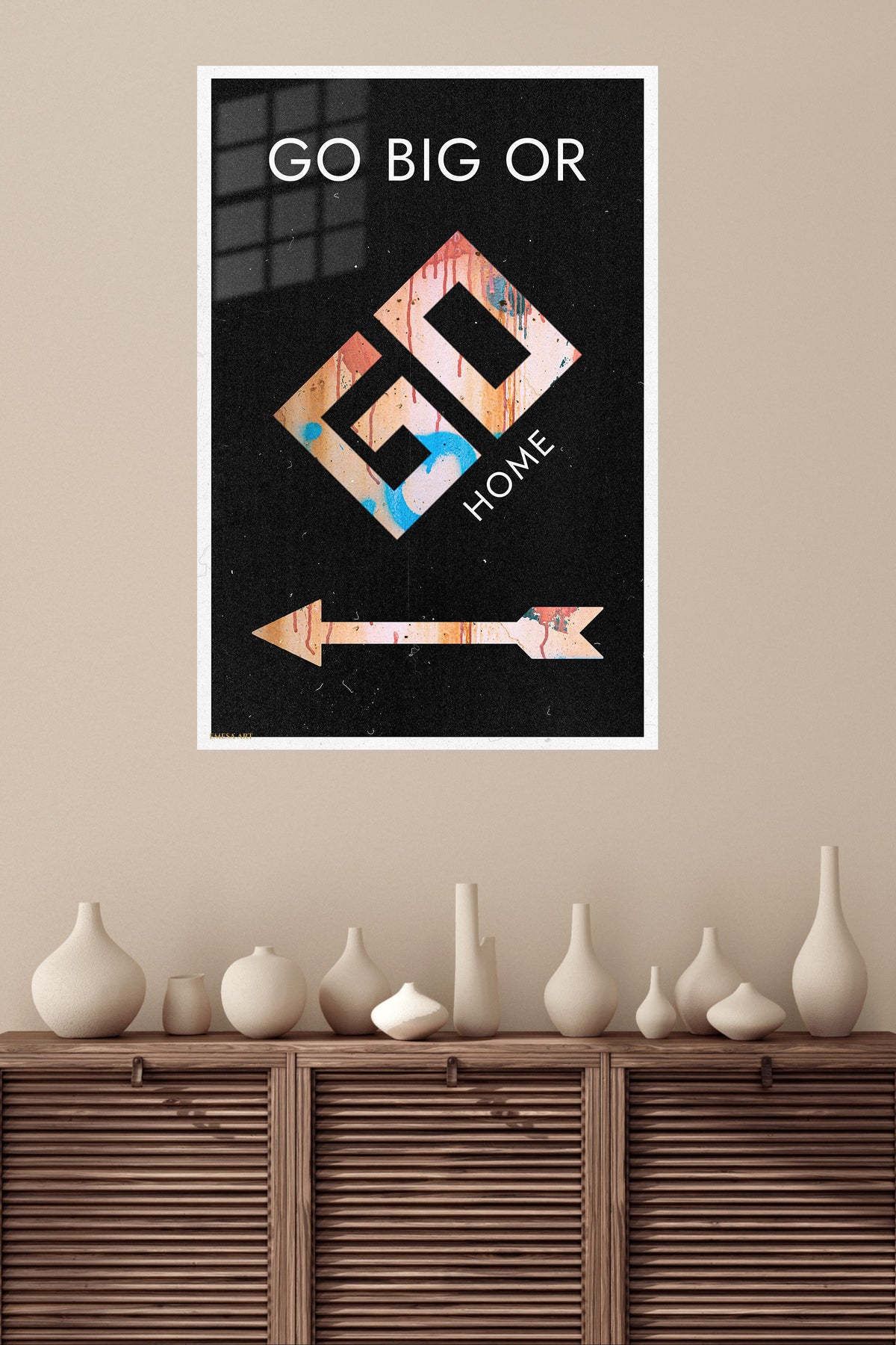 Go Big or Go Home metal wall art displayed in a modern interior