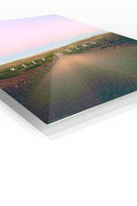Keep Going Desert Road premium metal wall art – angled view