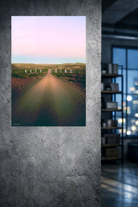 Keep Going Desert Road metal wall art displayed in a modern interior