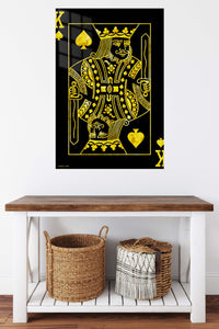 Golden King of Spades metal wall art displayed in a contemporary living space