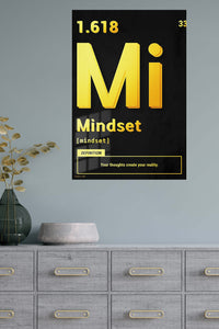 Mindset Definition in Gold metal wall art displayed in a modern interior