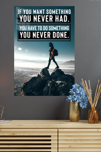 Do Something Never Done metal wall art displayed in a modern interior