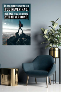 Do Something Never Done metal wall art displayed in a contemporary living space
