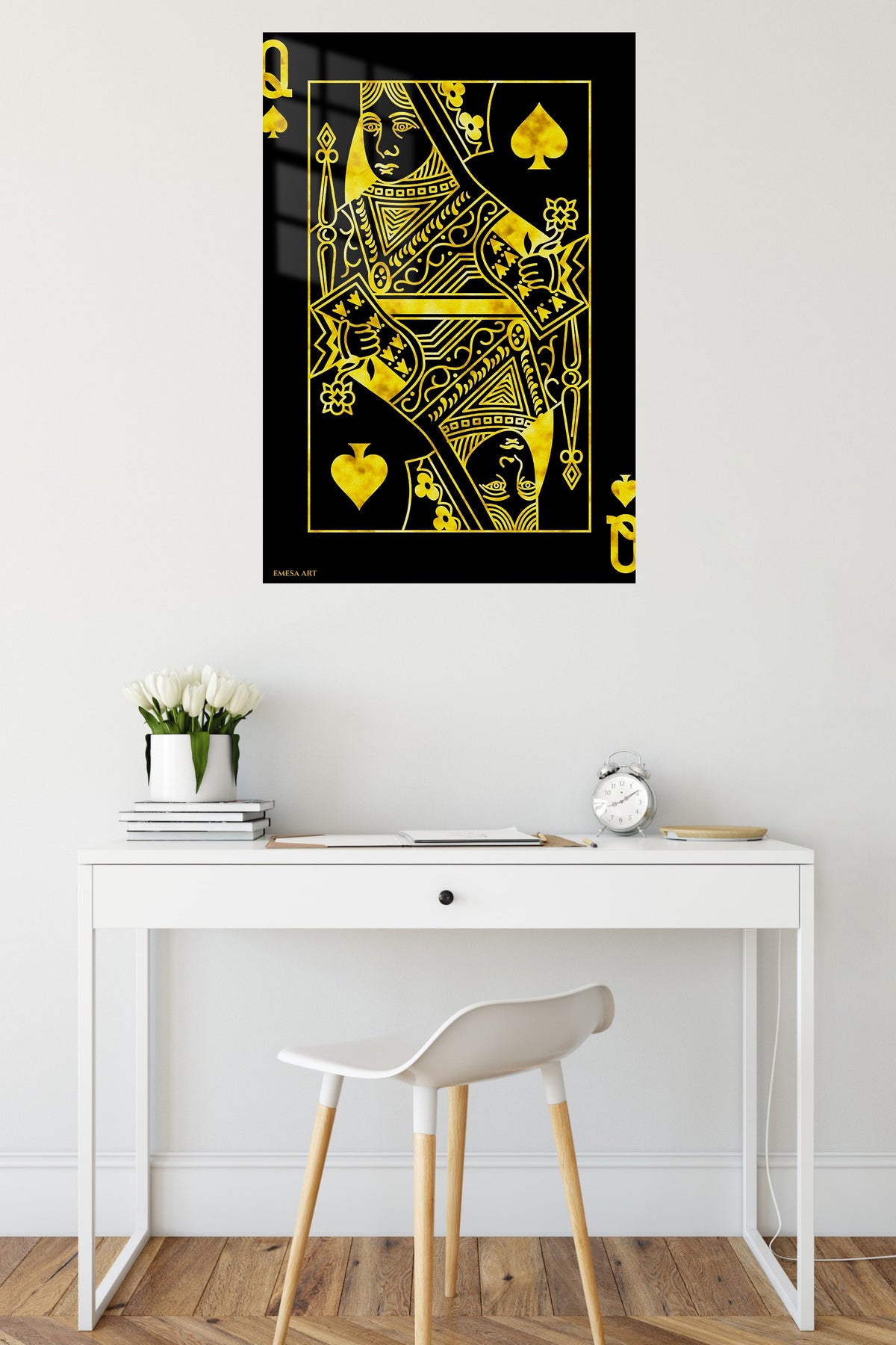 Golden Queen of Spades metal wall art displayed in a contemporary living space