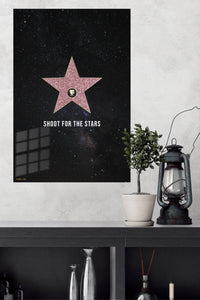 Shoot for the Stars metal wall art displayed in a modern interior
