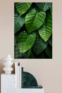 Rain-Kissed Tropical Leaves metal wall art displayed in a modern interior