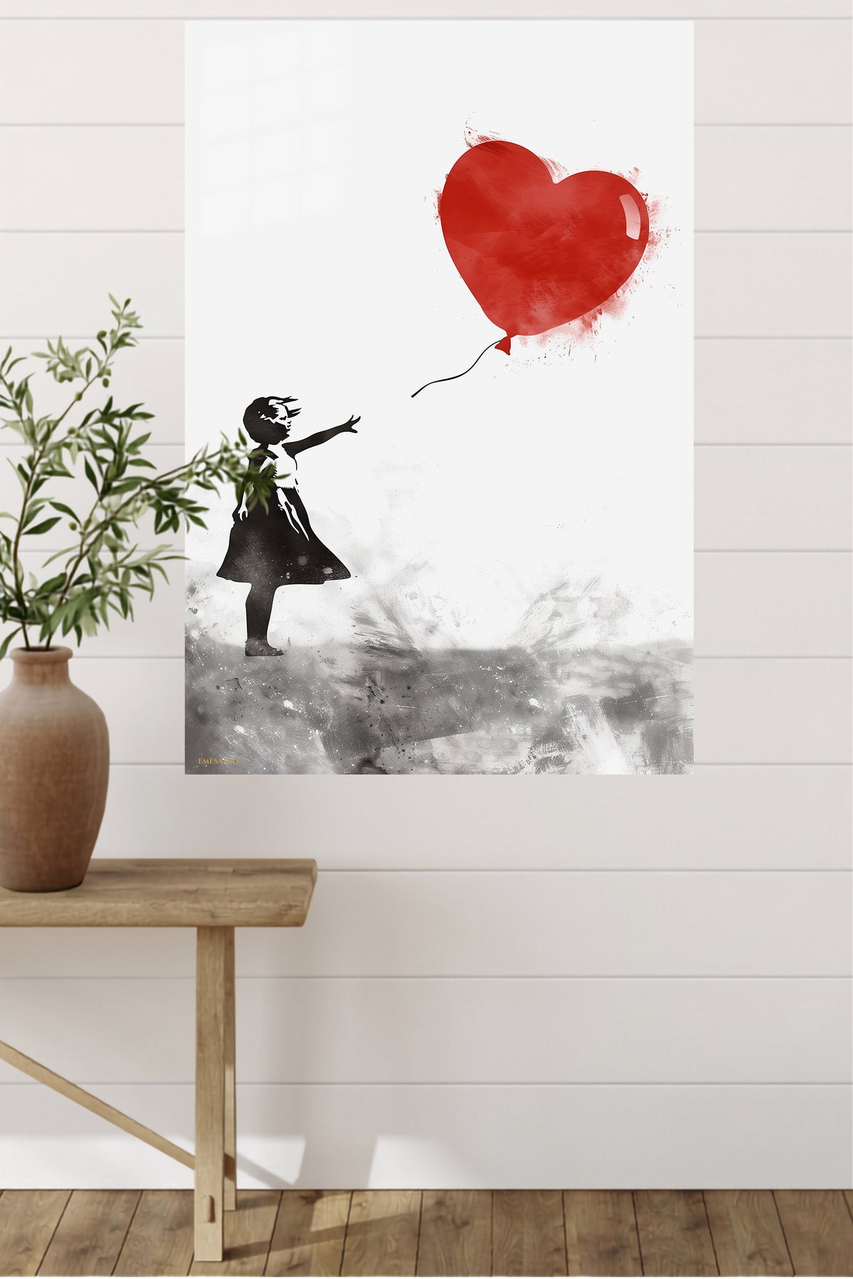 Girl and Red Heart Balloon metal wall art displayed in a modern interior