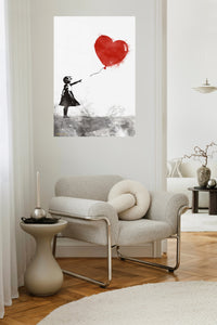 Girl and Red Heart Balloon metal wall art displayed in a contemporary living space