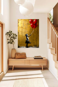 Girl with Red Balloons Street Art metal wall art displayed in a contemporary living space