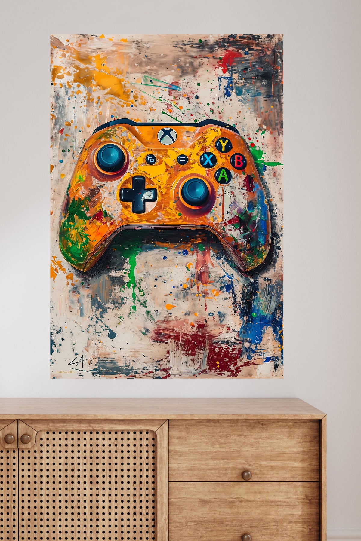 Orange Gaming Controller Splash metal wall art displayed in a modern interior